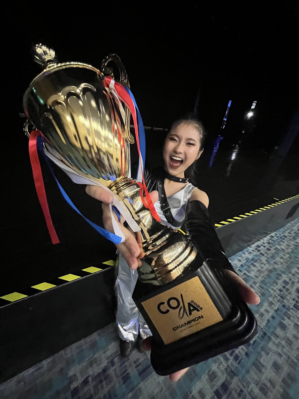 Holding the CODA 2024 champion trophy